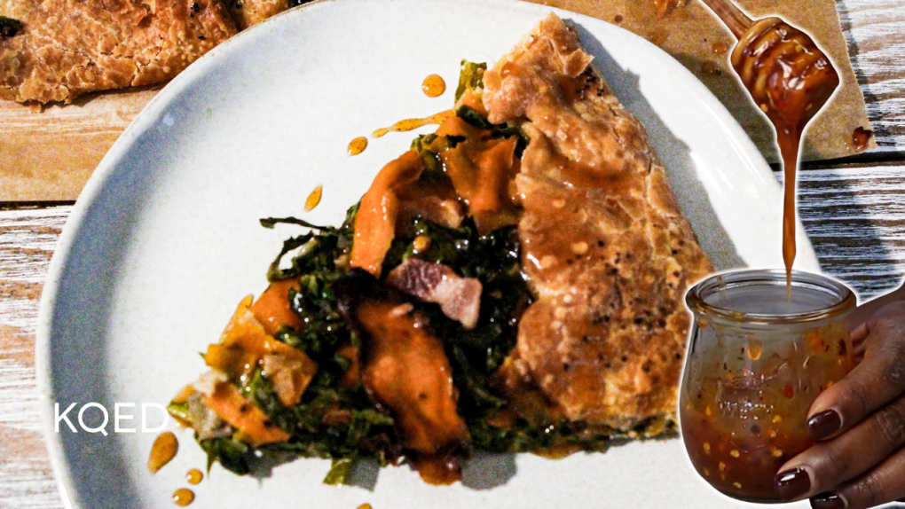 Slice of savory tart with sweet potato, chard, and a jar of hot honey